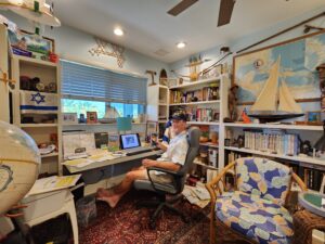 In his home office, author, historian & lecturer, Robert N. Macomber, is starting a Zoom interview with Craig Pittman, also an author, journalist and podcast host, with the topic of "From Slaves To Citizens."