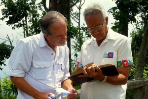 Author Robert N. Macomber in Eastern Cuba researching for the novels, HONORING THE ENEMY and WORD OF HONOR with Miguel Moncada.
